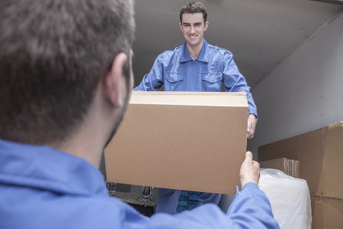Professional house removals service in Dagenham with moving van and packed boxes
