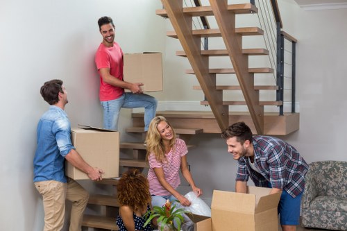 Packed boxes and furniture prepared for transport on moving day