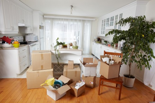 Moving boxes and household items being loaded from a Dagenham property
