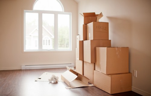 Careful loading of sofas and wardrobes by a local removals team