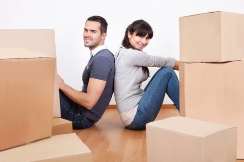 Shared house move with boxes and furniture in Dagenham