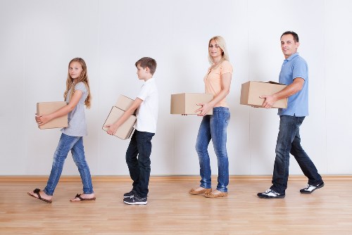 Local movers handling furniture and boxed belongings for a home move in Dagenham
