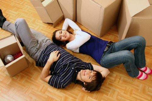 Local house removals crew supporting a move in Dagenham with furniture and boxes